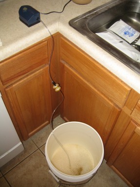 An aquarium pump with filter is a cheap and effective way to aerate.